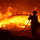 Illustration for article titled California pays prisoners $2 per day to fight wildfires